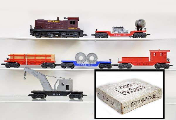 Boxed Marx Set 33984: Includes 1998 Santa Fe diesel with roar, broken front coupler; royal blue 4566 reel car; NYC wrecker; scarce ACL lumber car; 4571 searchlight; Santa Fe work caboose (includes Plasticville Signal Bridg
