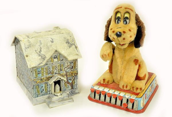 Battery Operated Toy Lot: Marx Buttons the Puppy with a Brain. 8 mechanical actions are functional, battery operated mechanism not functional at time of test. Haunted house bank, mechanism functional, chip on front steps. Othe