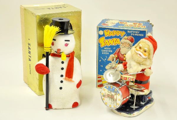 Boxed Holiday Battery Toys: Alps Drumming Santa, battery operated, mechanism functional. Some soiling to beard; Modern Toy Magic Snowman, mechanism did not work at time of test. Original balls still in packet with original pipe.