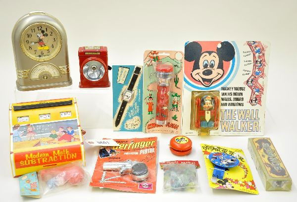 Interesting Group of Vintage Toys: Includes cowboy flashlight on card; Mickey Mouse wall walker on card dated 1972; Disney sparkler on card; Mickey Mouse clock, incomplete; Kilgore cap gun on card; Davey Crockett toy watch on card; dom