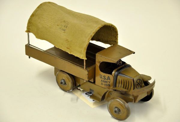 Scarce Early Marx Mack Army Truck: Circa 1920's, 10 1/2" long, litho tin, clockwork mechanism functional, original canvass top, shows light to moderate playwear. C7