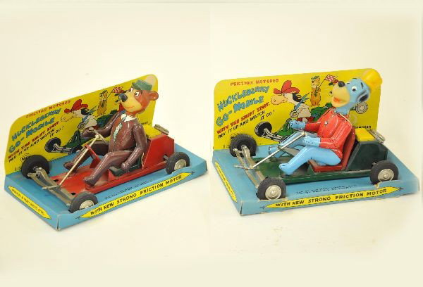 Boxed Marx Character Go Karts: Huckleberry Hound and Yogi the Bear, Go-Mobiles, 6 1/2" long each, litho tin, friction functional. Original display boxes are bright and clean, toys show light playwear, C8