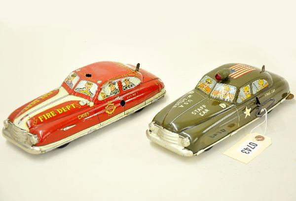 Marx Staff Car and Fire Chief Car: 11" long each, litho tin, both wind up mechanisms functional, both have battery operated lights, Fire Chief Car is missing light. Army car shows light playwear, C8. Fire Chief car shows moderate playw