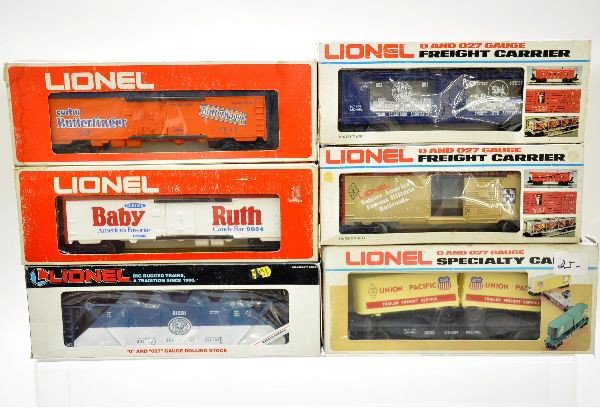 Boxed Lionel Rolling Stock: 19310 hopper; 9319 bouillon car (no coins); 9858 Butterfinger reefer; 9854 Baby Ruth reefer; 9418 commemorative boxcar; 9383 UP piggyback flat. All lightly run, original boxes show some wear, C8