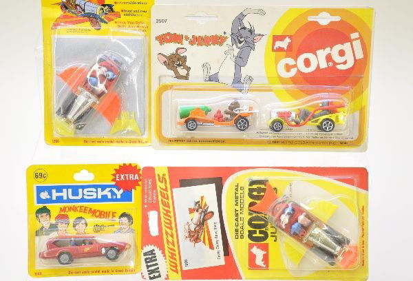 Corgi Junior Character Vehicles Plus: Corgy 2507 Tom & Jerry cars; Corgi 1006 Chitty Chitty Bang Bang; Husky 1206 Chitty Chitty Bang Bang, rear wing broken in package; Husky 1204 Monkeemobile Otherwise, factory sealed on cards. Cards show