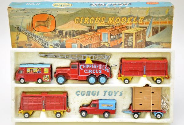Boxed Deluxe Corgi Chipperfields Gift Set #23: Includes booking office, circus crane, two cage wagons, (each missing one animal), Land Rover with elephant cage trailer. Scarce original set box with inserts, top shows some graffiti. Vehicles show l