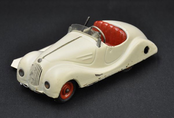 Schuco 2002 Akustico: Both mechanisms functional with key. Horn missing plastic cover. Original instructions. Car shows light playwear, C8