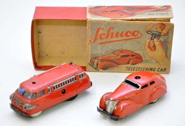 Schuco Telesteering Cars: #3000 coupe, mechanism functional, missing steering tether. Original box with sleeve. Shows light playwear, C8. 3047 Varianto fire truck, mechanism functional, missing steering tether. Shows moderate