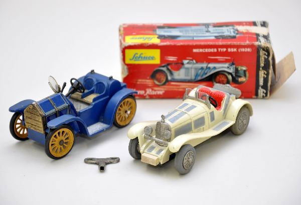 Schuco Micro Racers: 1043/1 Mercedes SSK with worn original box and key. 1036/1 Mercer 35J. Both mechanisms are functional and show light playwear, C7-8