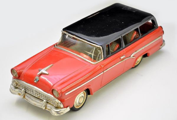Bandai 1958 Ford Country Squire Wagon: Litho tin, 12" long, nicely detailed with interior and opening tailgate. Clean and shiny showing light playwear, C7+-8