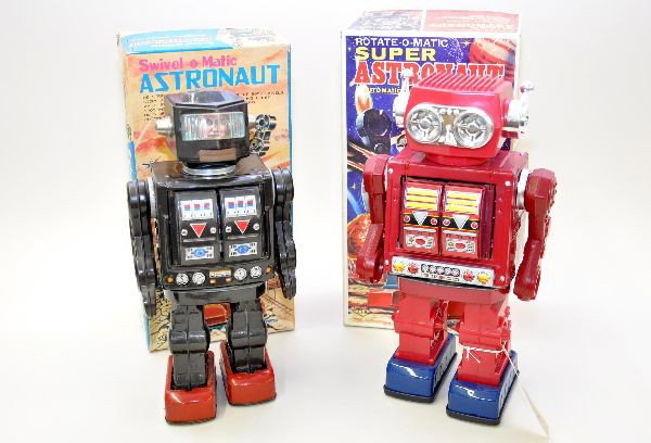 Boxed Astronaut Robots: Both are battery operated, 12" tall and function. Super Astronaut is Taiwan and has its packing inserts and is near mint, C9. Astronaut Robot is SH Japan with its original box, shows light to moderate