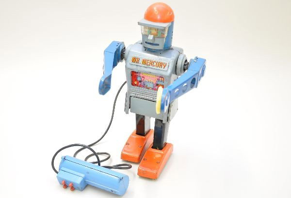 Marx Mr. Mercury Robot: Nice early robot. Litho tin, 14" tall, battery operated, mechanism functional, missing head antennas and has replaced foam hand pads. Otherwise, shows moderate playwear, C6