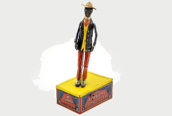 Strauss Tombo the Alabama Coon Jigger: Nice early (politically incorrect) toy, litho tin, 10 1/2" tall, mechanism intermittent and slips, shows light to moderate playwear, C7-7+