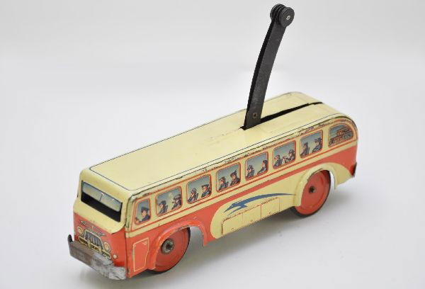 Unusual Karl Bub Electric Bus: Litho tin, 7 1/2" long, lever action working, shows light to moderate playwear, C7