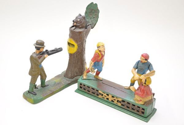 Book of Knowledge Cast Iron Banks: These are the first series of reproduction banks done in the 1950's Home Town Battery and Teddy and the Bear banks. Mechanisms are functional. Like new C8-9