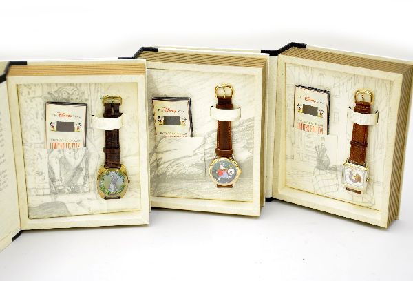 3 Boxed Disney Character Watches: Limited Edition Series II watches made by Fossil. DS-70 Lady and the Tramp, DS-67 Alice in Wonderland; DS-69 The Jungle Book. All appear factory new, with brochure, box, insert and sleeve.