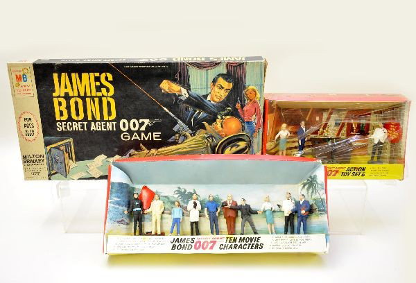James Bond 007 Toy Lot: Milton Bradley Secret Agent game, appears complete and lightly used, box top shows wear; AC Gilbert rare 10 movie character set dated 1965, Largo is loose from display; AC Gilbert toy set #5 with M's 