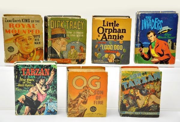 7 Big Little Books: All hard covered. 2012 The Invaders, 1115 Og, 1477 Son of Tarzan, 2005 Tarzan, 1452 Royal Mounted, 749 Dick Tracy (some wear to spine), 1186 Little Orphan Annie. All appear complete. Otherwise, show l