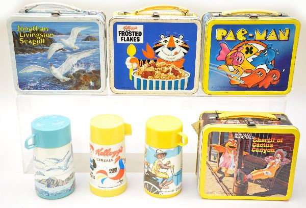 Miscellaneous Lunch Box Lot: Aladdin Industries 1969, Kelloggs Breakfast with plastic thermos; Aladdin Industries 1980, Pac Man embossed; Unusual Aladdin Industries 1973, Jonathan Livingston Seagull, non-embossed with plastic the