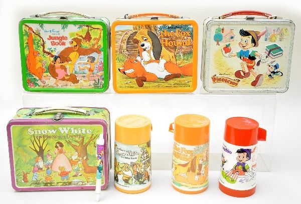 Disney Lunch Boxes: Aladdin Industries 1971, Pinocchio with plastic thermos; Aladdin Industries 1981, Fox and the Hound with original store tag and thermos, near mint; Aladdin Industries 1968, Jungle Book; Ohio Art 1975