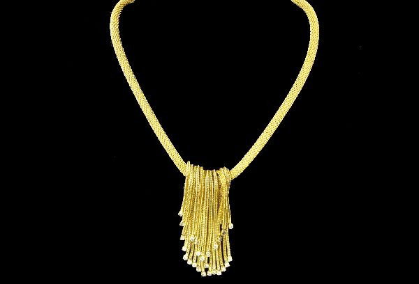 Vintage Hattie Carnegie Waterfall Necklace: Lovely "waterfall" necklace by Hattie Carnegie. Two of the rhinestones need cleaning