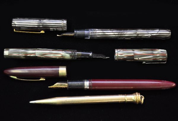Vintage Pen Lot: Waterman's Ideal fountain pen, abalone style colored plastic, 4 1/4" long, has original tip; Wahl Eversharp gold-filled mechanical pencil. 4 1/4" long; Majestic fountain pen, 5" long with plastic abal