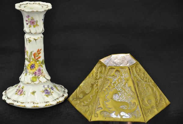 Limoges Candle Stick & Brass Pierced Shade: Lovely antique Limoges (MR France) candle stick with hand painted flowers, 6" high by 3-1/2". Brass shade for small oil lamp. Pierced all over with a predominant design of a sea monster. There is disc