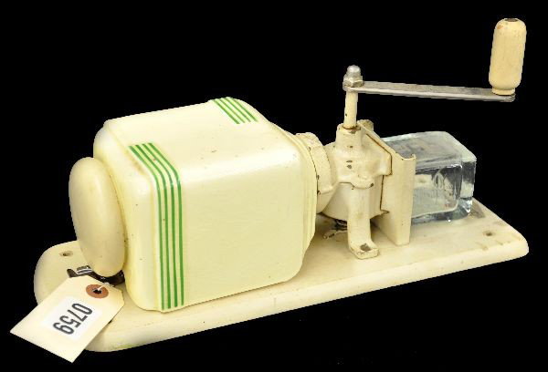Unusual Art Deco Zassenhaus Coffee Grinder: Fluted porcelain hopper with wooden top, shows some light crazing on hopper. Cast iron grinder with glass receptacle. All mounted on original wooden hanger. Fairly clean, showing signs of use. Nice lo