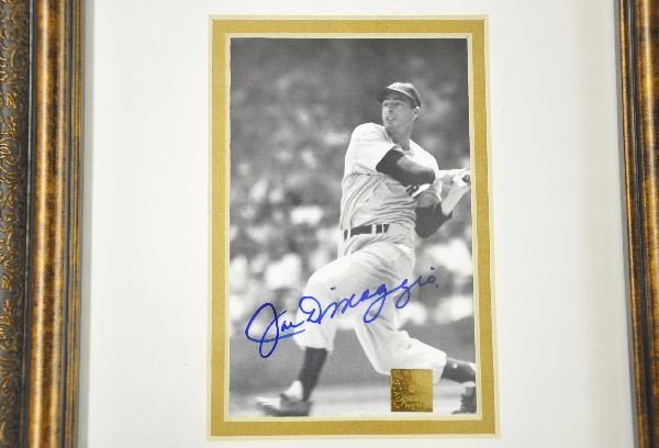 Joe DiMaggio Autographed Photo: 4" x 6" matted black &white glossy photo in a 10" x 12" frame, complete with certificate of authenticity from Chris Morales, certified document examiner. Nice clear signature in blue felt pen. A beaut