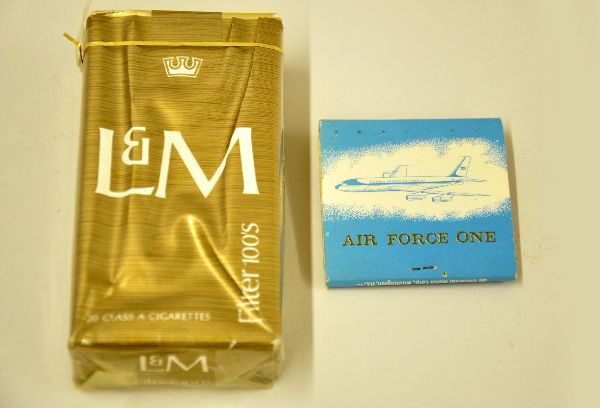 Unusual Air Force One L&M Cigarettes: Circa 1960s sealed pack of L&M filter 100s and a book of matches. Both with the Air Force One markings. Great for making up stories about how you obtained these!