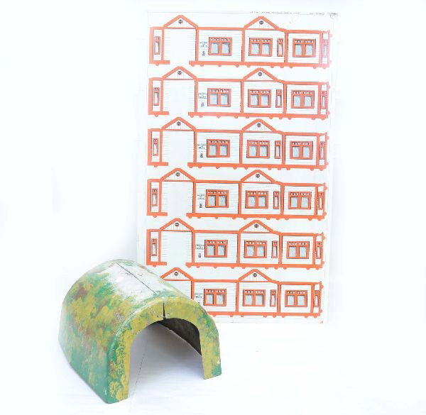 Marx Prototype Tunnel & Uncut Production Sheet: Hand painted illuminated tunnel. Inside both halves are marked Model #921, Model #924 Girard-Feb. 5, 1940 dies FYLL. Factory uncut sheet of shanty houses RA-728.