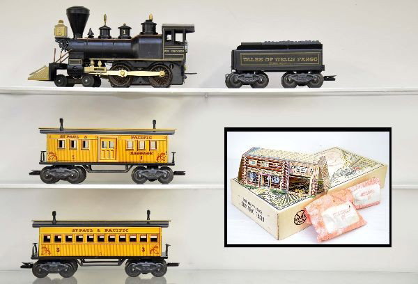 Boxed Marx Tales of The Wells Fargo Playset: Box No.54762 is about as good as it gets! Deluxe Wm Crooks locomotive; TWF tender with strong lettering; baggage; coach; track; transformer; and instructions. All are unrun. Complete western playset w