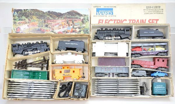 Two Near Mint Boxed Marx Sets: Set No. 4351 includes 490 loco, tender, tank car, hopper, caboose, figure 8 track, with mint 34 pc village set in envelope, track and transformer. Montgomery Ward set No. 25755 includes a 490 loco wit