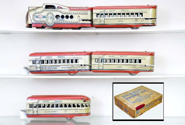 Boxed Marx M10005 Set 7844: 10,005 UP diesel, pre-war motor; RPO car; 2 Omaha Pullmans; Squaw Bonnet observation, track, metal trestle bases, transformer and set box. Shows moderate playwear, C6+