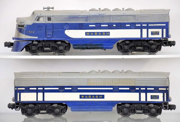 Lionel 2367 Wabash F3 AB Diesels: Double motor A unit power, battery damage on frame has been touched up, decal on cab worn at door guides; heat stamped B unit. Otherwise, shows moderate playwear, C6-