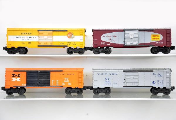 4 Lionel Boxcars: 6468 New Haven double door; 6464-375 Central of Georgia, Type 2b, decals 100%; 6464-1 Western Pacific, Type 1, blue lettering; 6464-500 Timken, decals 100%, Type 2b. All show light to moderate playwea