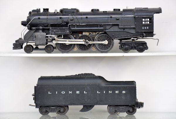 Lionel 646 Hudson Locomotive: White rubber stamp cab lettering, missing one jewel and running light slightly bent; 2046W tender. Shows moderate playwear, C6