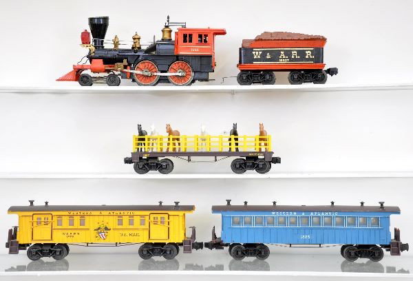 Scarce Lionel Halloween General Set: Made for Sears only in these colors. 1882 Wm Crooks loco, one handrail stanchion slightly bent; 1882T tender; 1885 coach, one broken step and handrail; 1866 mail car; 1887 flat with horses. Set shows 