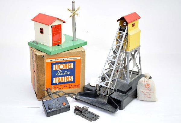 2 Lionel Accessories: 45N Operating gateman with original box, shows moderate playwear, C6; 97 coal elevator with 206 coal and controller Shows light to moderate playwear, C7
