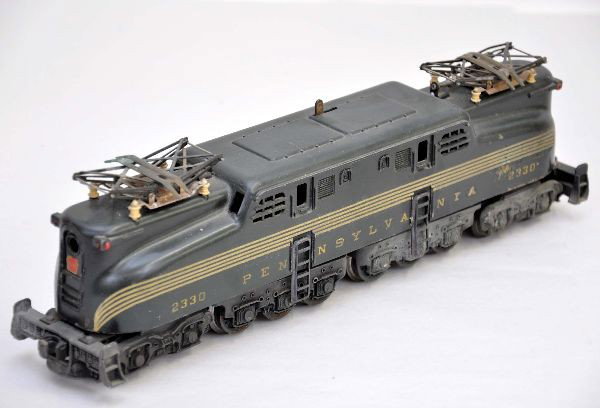 Lionel 2330 Pennsylvania GG1: 1950 production with Magna-Traction. Shell has been re-striped, pantographs have some corrosion and is missing one insulator. Otherwise, shows moderate playwear, C6