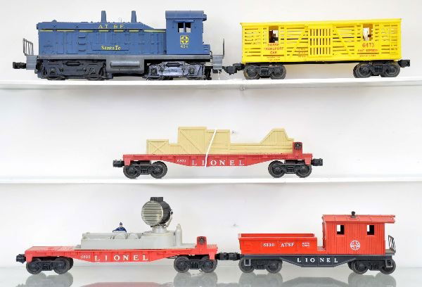 5 pc. Late Lionel Diesel Freight Set: 634 Santa Fe NW2 diesel; 6821 flat with crates; 6473 horse transport car, red lettered; 6822 night crew searchlight; 6130 Santa Fe work caboose. All show light playwear, should clean to C7+