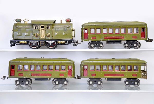 4 pc. Lionel Passenger Set: 254 locomotive, some wheel fatigue, missing couplers and one roller; 2 #610 Pullmans; 612 observation, missing coupler with broken coupler support. Otherwise, set matches in color with nice lettering,