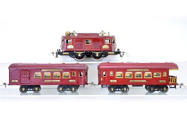 Three Piece Ives Standard Gauge Train Set: 3235R box cab electric, plated; 184 combine; 186 observation. Cars are plated as well. Set shows moderate playwear, C6