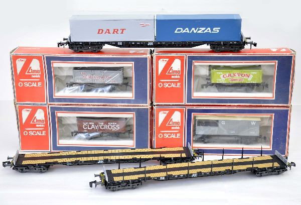 7 European Freight Cars: O-Gauge. Lima Kendall open wagon, Paxton ore car, Clay Cross iron ore car, GW brake van. Rivarossi 2 #7565 stake flats, each 18" long, 7566 container flat, 18" long, All as un-run, original boxes with