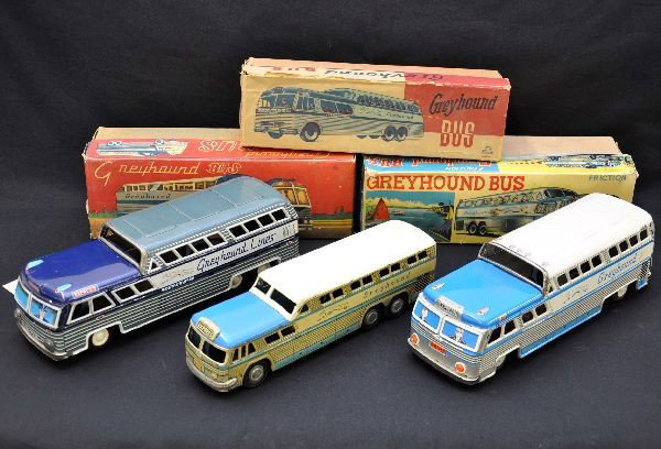 3 Boxed Japanese Tin Greyhound Buses: All 11" long. Blue and gray Scenicruiser; HS Japan white and blue; Stone Japan, narrow Scenicrusier, which shows some chrome wear. All are friction drive and are functioning. All have original boxes a