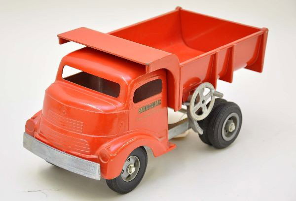 Super Smith-Miller Dump Truck: Factory painted die cast, 12" long, dump mechanism functional, all components are intact. Shows light playwear, C8