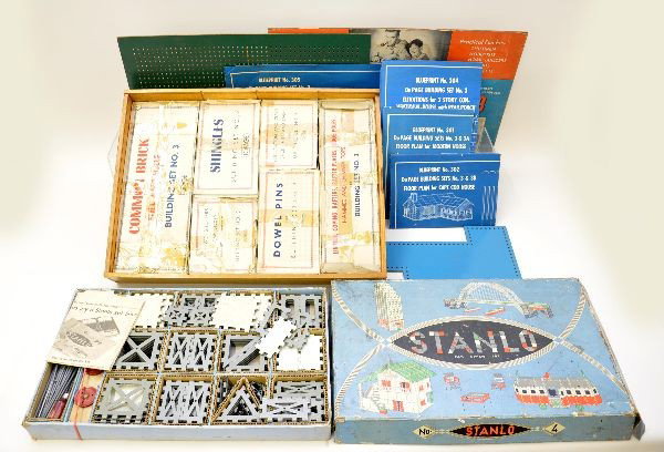 Two Unusual Constructor Sets: Boxed Stanlo #4, unusual metal construction pieces with instructions. Appears complete, but not guaranteed; DuPage Building Set No.3. This is a wooden and masonite set including baseboard and 6 boxes 