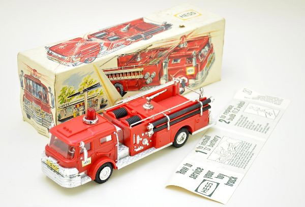Scarce Boxed Hess Fire Pumper: Circa 1970, made by Marx. Is very clean with minor wear on chrome power nozzle, small crack in side railing. Includes original ladders and hoses. Bubble light is loose, but tabs are intact. Includes o