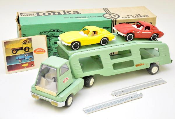 Boxed Tonka 96 Auto-Loader with Corvettes: Circa 1968, pressed steel with plastic cars, 12" overall length. Includes original ramps and catalog, but is missing 1 tail light lens. Shows very light wear. Original box shows minor wear. Otherwise,