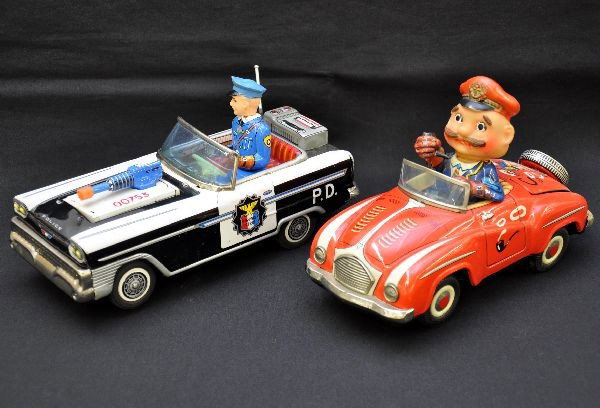 Early Battery Toy Cars: Smokey Joe in sports car, SAN, Japan, mechanism functional, mystery action, pipe lights, head smokes (a little) Some light rust spots near battery box and on bumper, C6; Chevy Highway Patrol car, batt